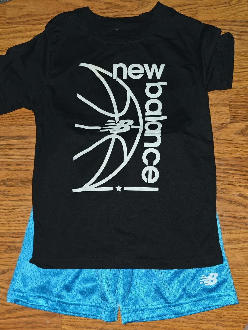 New Balance Black Tee with White Basketball Graphic